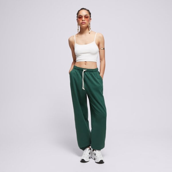 Spodnie dresowe damskie NEW BALANCE SPODNIE ATHLETICS FRENCH TERRY JOGGER wp41513nwg kolor zielony