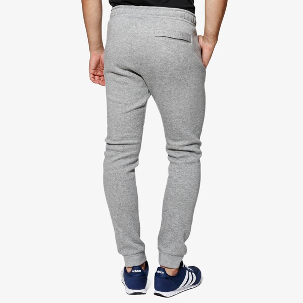 Spodnie dresowe męskie NIKE SPODNIE M NSW JGGR FLC HBR 928725-063 kolor szary