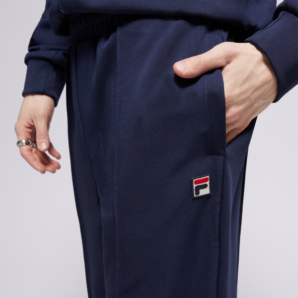 Spodnie dresowe męskie FILA SPODNIE PIN TUCK SLIM LEG PANT fw24mh035410 kolor granatowy
