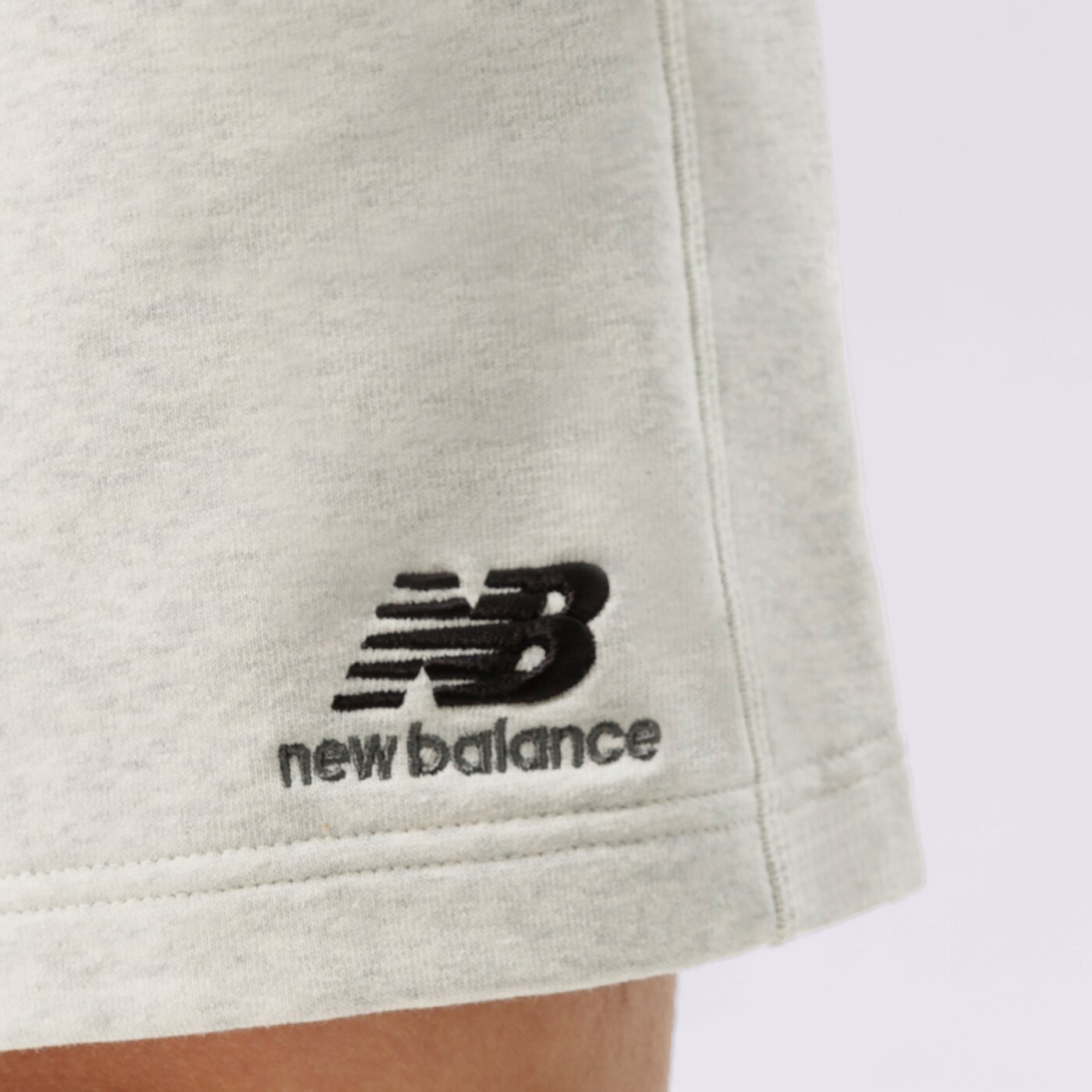 Spodenki damskie NEW BALANCE SZORTY NB ESSENTIALS UNI-SSENTIALS FLEECE SHORT us21500sah kolor szary