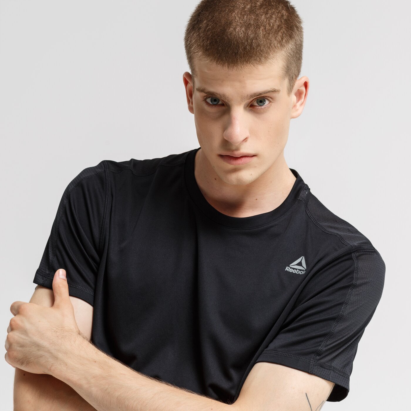 Koszulka męska REEBOK T-SHIRT WOR TECH TOP - REGULAR du2183 kolor czarny