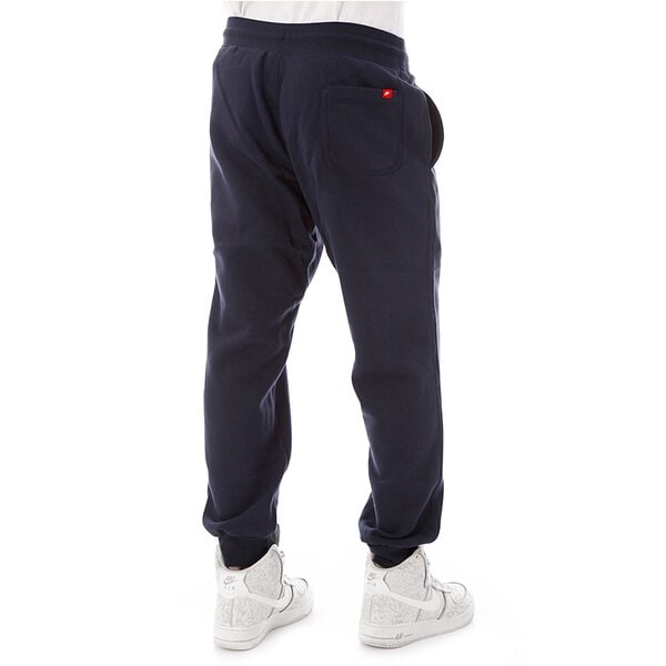 Spodnie dresowe męskie NIKE SPODNIE NIKE AW77 CUFF FLC PANT 598871473 kolor granatowy