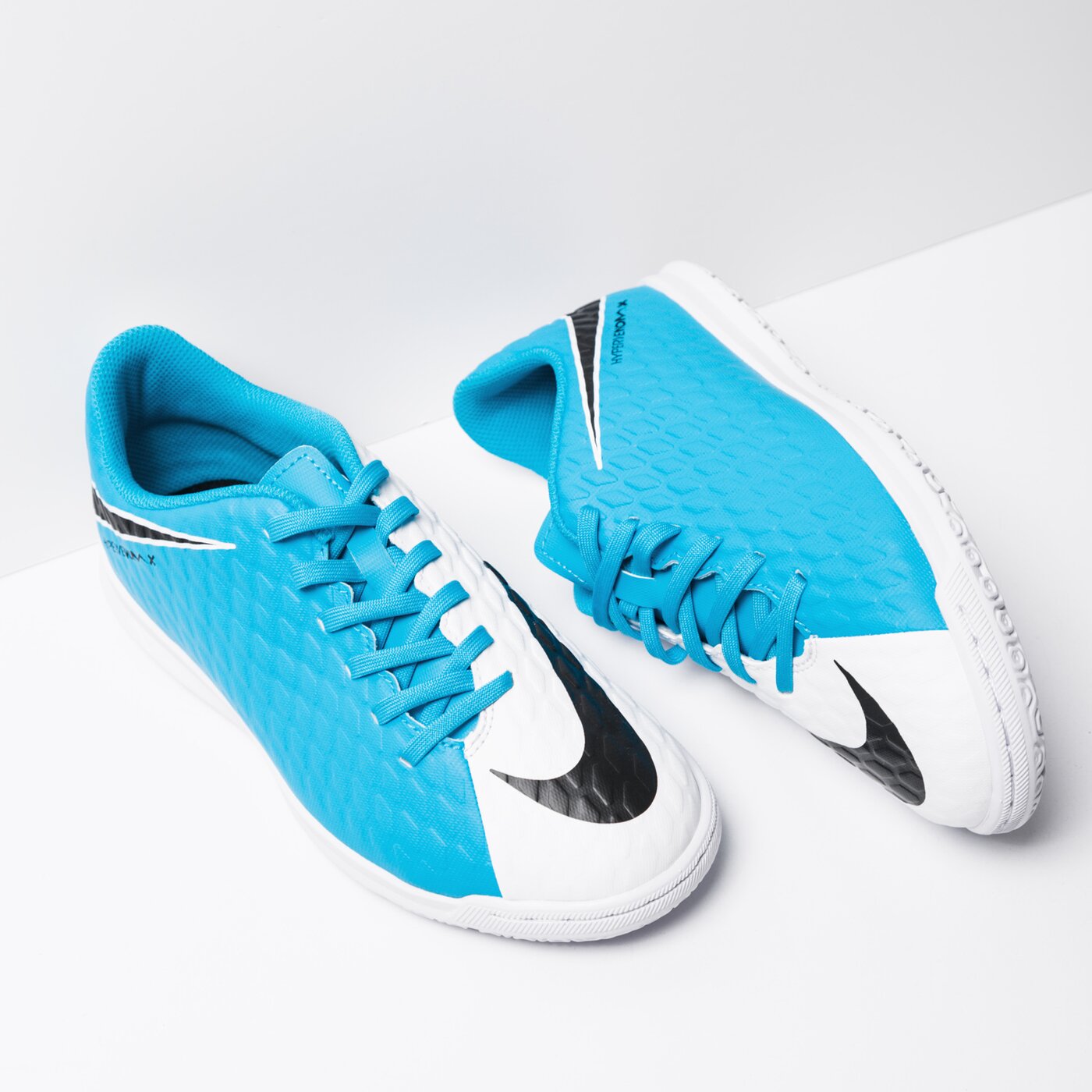 Buty piłkarskie dla dzieci NIKE JR HYPERVENOM PHADE III IC 852583-104 kolor niebieski