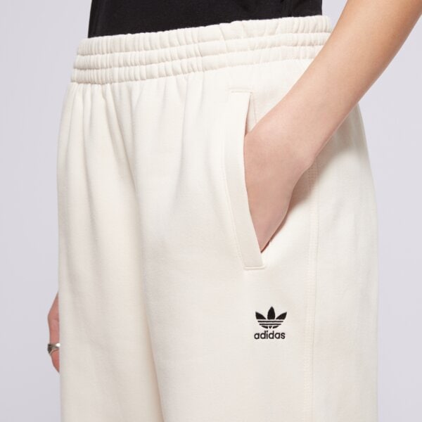 Spodnie dresowe damskie ADIDAS SPODNIE ESS JOGGERS iy9635 kolor biały