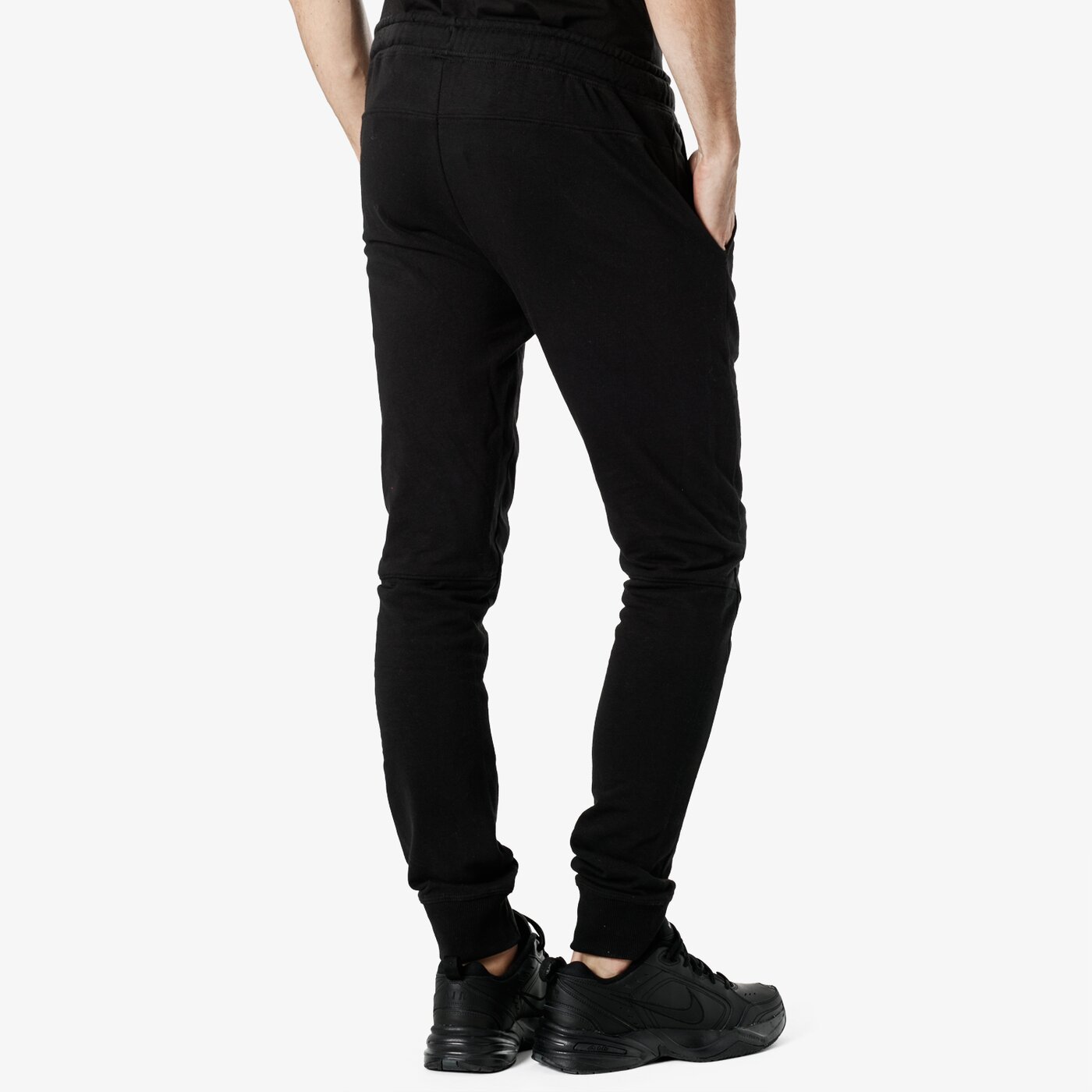 Spodnie dresowe męskie UMBRO SPODNIE SLIM FIT FLEECE 65623u-060 kolor czarny