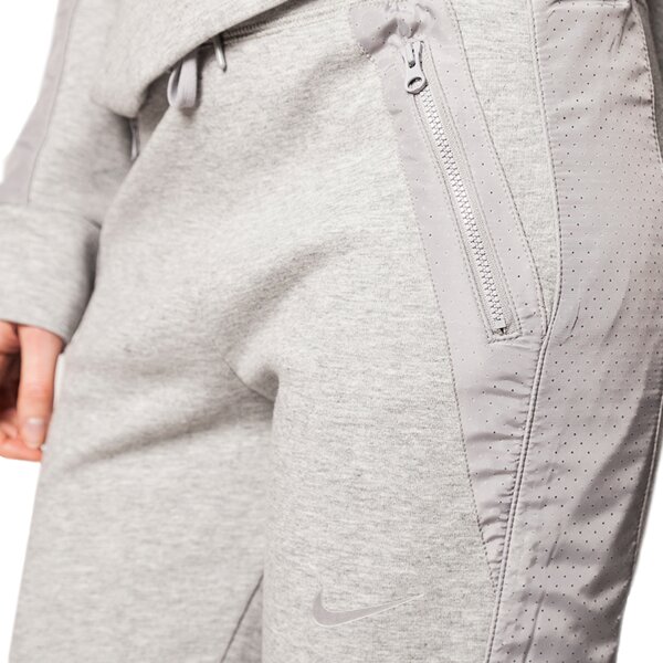 Spodnie dresowe damskie NIKE SPODNIE ADVANCE 15 FLEECE PANT 725722063 kolor szary