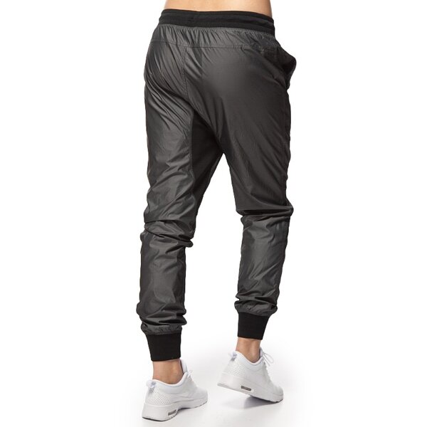 Spodnie dresowe damskie NIKE SPODNIE WOVEN PANT T2 684923211 kolor szary