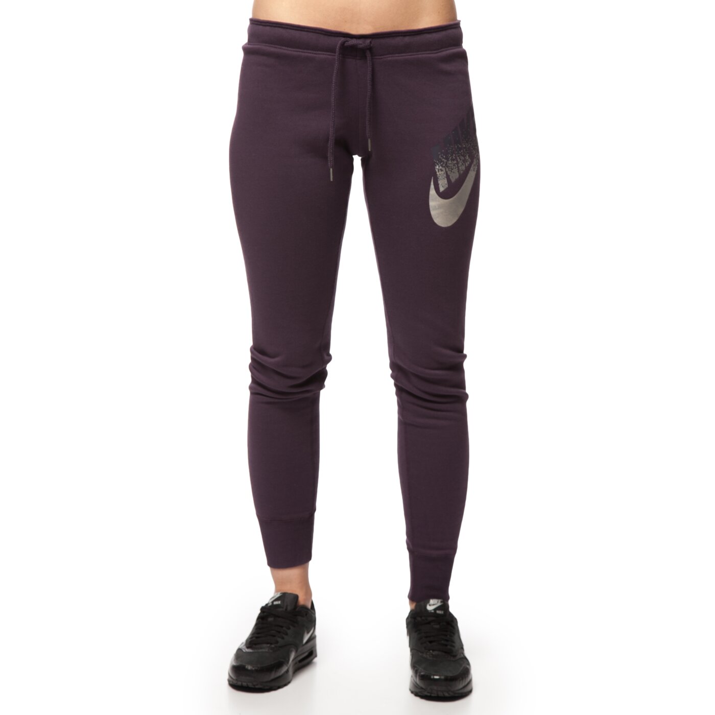 Spodnie dresowe damskie NIKE SPODNIE RALLY PANT TIGHT 678852507 kolor fioletowy